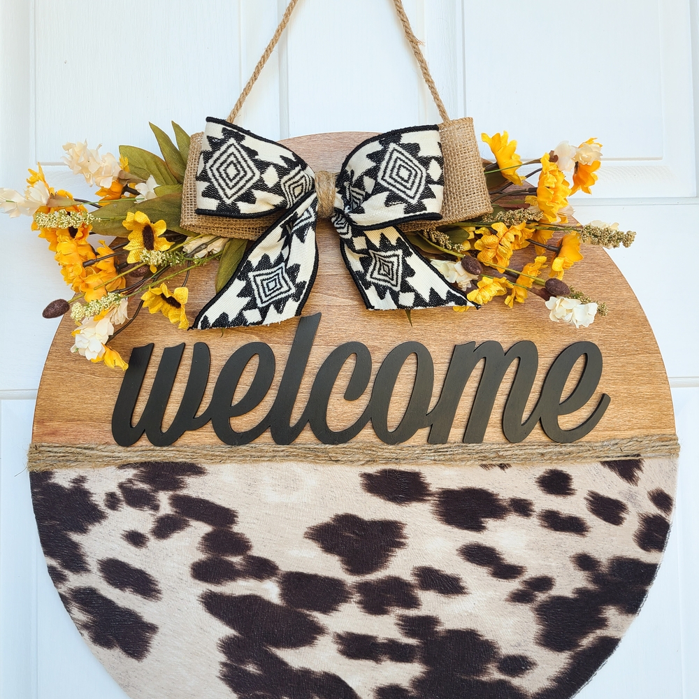 Rustic Welcome Cowhide Sign with Floral Accents